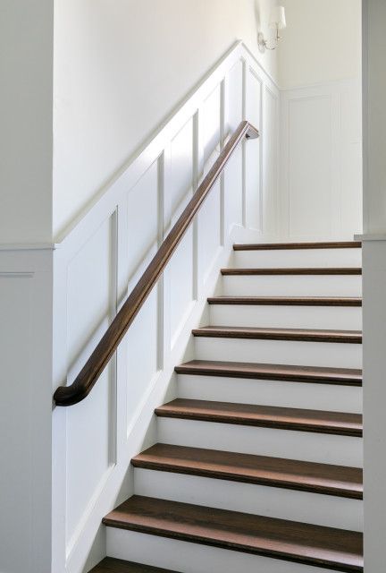 Blue's Beach House (Ponte Vedra Beach) - Beach Style - Staircase - Jacksonville - by Heritage Homes of Jacksonville | Houzz Enclosed Staircase Makeover, Enclosed Stairs Ideas, Stairway Trim Ideas, Enclosed Stairwell Decor, Stairwell Wainscoting, Enclosed Stairwell, Enclosed Staircase Ideas, Enclosed Stairs, Wainscotting Ideas