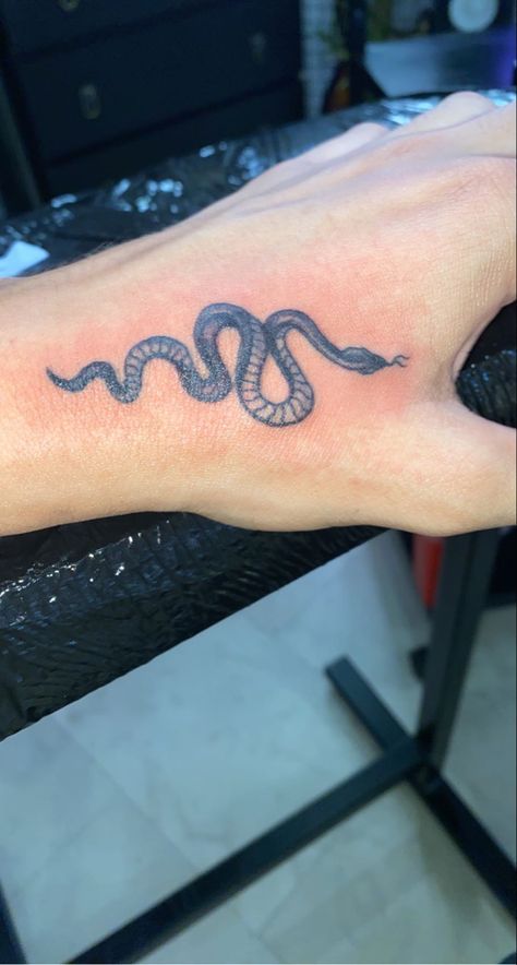 Snake Tattoo On Hand Men, Hand Tattoos For Guys Snake, Small Snake Tattoo On Hand, Simple Tatoo For Boys In Hand, Small Mens Hand Tattoo, Men’s Hand Tattoos Simple, Men Snake Tattoo Ideas, Small Men’s Hand Tattoo, Simple Hand Tats Men