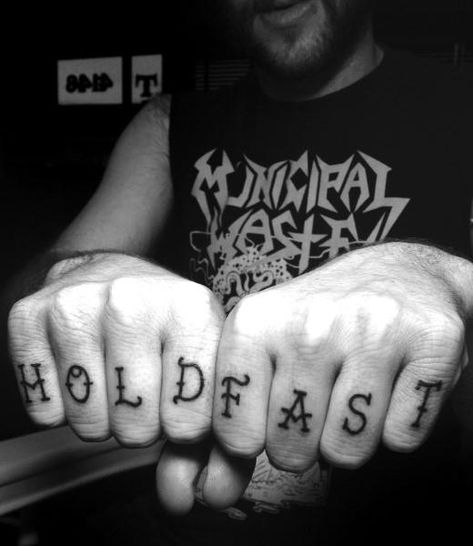 Man With Hold Fast Knuckle Tattoo In Black Ink Knuckle Tattoos For Guys, Hold Fast Tattoo, Knuckles Tattoo, Wing Tattoo Men, Sailor Tattoos, Sailor Tattoo, Knuckle Tattoos, Nautical Tattoo, Back Of Shoulder Tattoo