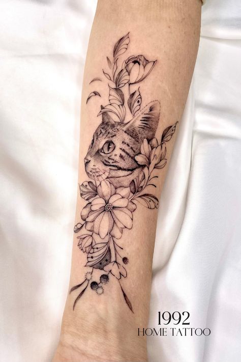 Fall in love with every stroke and detail of this captivating cat & flower tattoo by Jeremy! 🐱 #1992hometattoo #flowers #flower #cat #catstagram #cattattoo #flowerstagram #flowarts #flowertattoo #ink #finelinetattoo Cat In Flowers Tattoo, Catnip Tattoo, Flowers Fine Line Tattoo, Cat With Flowers Tattoo, Cat Flower Tattoo, Simple Cat Tattoo, Portrait With Flowers, Lily Cat, Brother Tattoos