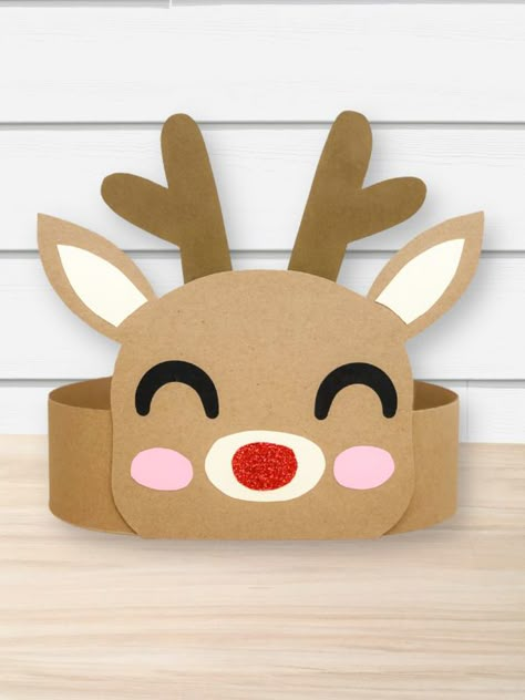 Christmas is right around the corner! Give your kids some holiday fun by doing some of these reindeer activities for kids! You'll find coloring pages, printables, worksheets, crafts, and more. They're great for preschoolers, kindergarten, and elementary children to do at home or in the classroom! Raindeer Crafts Hats, Reindeer Mask For Kids, Reindeer Hat Template Free Printable, Raindeer Crafts For Preschoolers, Reindeer Hats For Kids, Reindeer Preschool Crafts, Reindeer Headband Craft, Deer Ears Headband, Reindeer Crafts For Kids