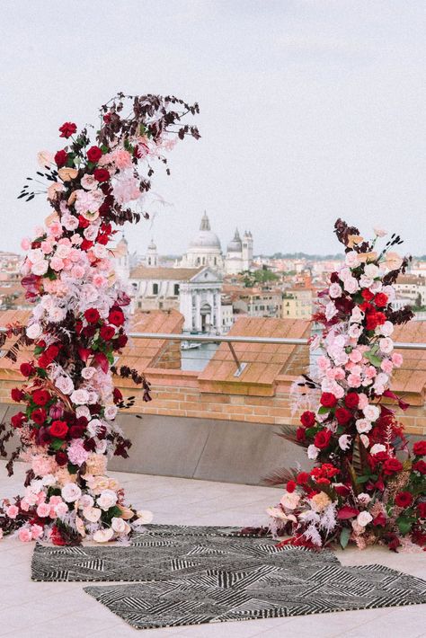 Pink And Red Flower Installation, Red And Pink Ceremony Flowers, Red Flower Arch Wedding, Red And Pink Wedding Party, Red And Pink Floral Arch, Red And Pink Wedding Florals, Red Pink Wedding Flowers, Red Pink Wedding Theme, Pink And Red Florals