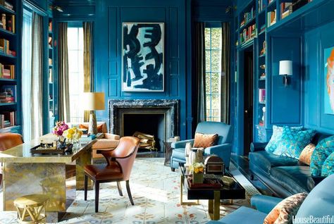 Steven Gambrel ~ Walls in a custom peacock-blue lacquer by Fine Paints of Europe give depth and richness to the library of a Chicago townhouse. Designer Steven Gambrel dialed up color here and throughout the home to compensate for Chicago's long winters. The abstract painting is from Showplace Antique & Design Center. The desk and coffee table are 1960s French pieces. The curtains are End Paper from Stark Blue Library, Fine Paints Of Europe, Lacquered Walls, Chicago House, Boho Lifestyle, Set Sofa, Salou, Blue Rooms, House Beautiful