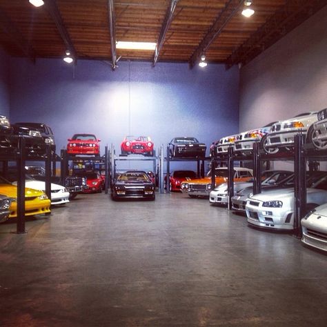 Dream Garage Car Enthusiast Garage, Custom Car Garage, Car Warehouse Dream Garage, Garage Full Of Cars, Garage With Cars, Car Collection Garage, Giant Garage, Garage Architecture, Fancy Garage