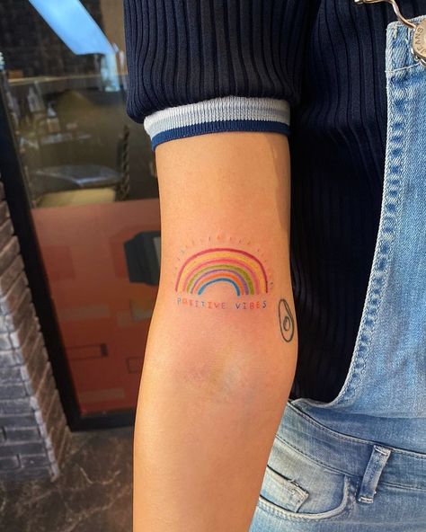 #rainbow #tattoo #positive #colorful #simpletattoo #minimaltattoo #rainbowtattoo #simple Rainbow Flowers Tattoo, Colorful Minimalist Tattoo, Simple Rainbow Tattoo, Minimalist Rainbow Tattoo, Small Rainbow Tattoo, Somewhere Over The Rainbow Tattoo, Rainbow Tattoo Ideas, Rainbow Tattoo, Gay Tattoo