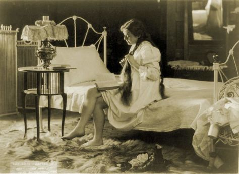 woman in bedroom 1900-1920 | from collections library of congress 1920 Bedroom, Finishing A Book, Historical Interior, Bedroom Book, Long Nightgown, Photo Woman, Before Going To Bed, Bed Bedroom, Going To Bed