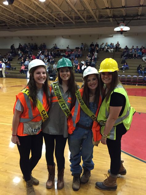 Construction worker student section theme! Construction Theme School, Neon Student Section, Student Section Ideas, Student Section Themes, Pep Rally Themes, Football Season Outfits, Construction Outfit, Student Section, Hockey Outfits