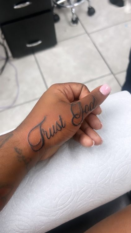 Trust God Tattoo On Hand, Trust God Hand Tattoo, God Created You Different Tattoo Hand, Fear God Hand Tattoo, Tatoos Black Woman Hand, Gods Plan Tattoo, Trust God Tattoo, In God We Trust Tattoo, Plan Tattoo