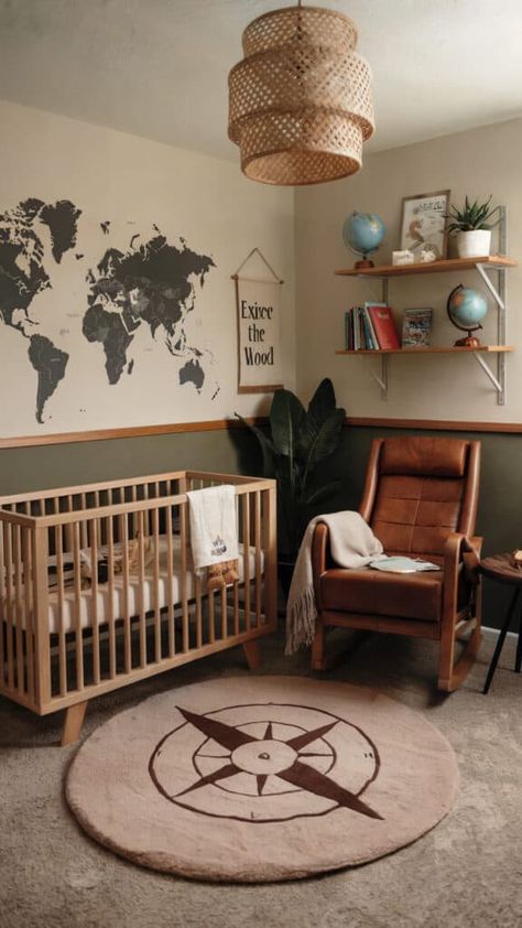 Travel-themed baby boy nursery with a world map mural, globes, and compass rug. Nursery Ideas Travel Theme, Leather Nursery Chair, Little Explorer Nursery, National Parks Nursery Theme, National Park Nursery Theme, Map Themed Nursery, Atlas Nursery, Travel Baby Room, 2nd Time Mom