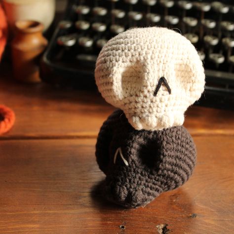 Cute little crocheted skulls now available to purchase already made up - with or without the little devilish horns 😈💀 #halloweendecor #skullplush #crochetskull Skull Amigurumi, Skull Crochet, Amigurumi Patterns Free, Crochet Skull, Crochet Ideas, Halloween Decorations, Amigurumi, Knitting, Crochet