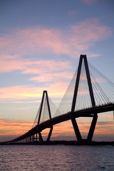 The Cooper River Bridge is 2.5 miles in total length and includes two major high-level interchanges on each end of the bridge. Opened to traffic in July 2005, this award-winning bridge opened one year ahead of schedule. At the time of opening   it was the longest cable-stayed span in North America. Cooper River Bridge, Cable Stayed Bridge, Construction Engineering, Rv Trip, River Bridge, Traffic Safety, Bridge Design, Charleston South Carolina, Rv Travel