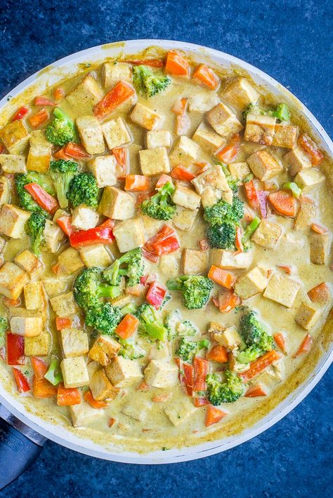 This Easy Coconut Curry with Tofu is a healthy and delicious 30 minute dinner recipe that's made entirely in one pan! It's so easy to make and perfect for a quick and easy weeknight dinner that's also vegan, gluten free and kid friendly! #coconutcurry #curry #dinner #30minutedinner Easy Coconut Curry, Kid Friendly Vegetarian Recipes, Curry With Tofu, Curry Dinner, Curry Tofu, Coconut Curry Recipes, Curry Food, Easy Vegetarian Dinner, Weekly Meal Plan