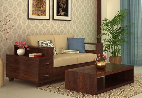 Buy Solace 2 Seater Wooden Sofa Online with Walnut Finish and add this #elegant #two #seater #sofa to your living space for beautiful #interiors and attain #lively impact. Get #2SeaterSofa #with #storage online from the fantastic range #Ahmedabad #Hyderabad #Bhopal #Faridabad बेडरूम डिजाइन, Drawing Room Decor, Indian Living Rooms, L Shape Sofa, Wooden Sofa Designs, Indian Home Interior, Wooden Sofa Set, Living Room Sofa Design, Living Room Partition Design