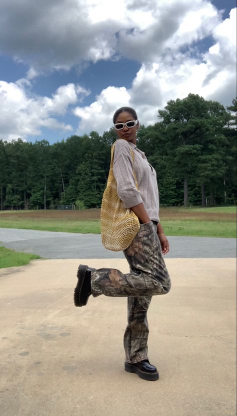 Top H&M |Pants Mossy Oak |Shoes Dr. Martens • • • • #blackgirlfashion #outfits #outfitideas #fashion #blackgirloutfits #drmartensoutfit #camouflage #neutralstyle #thriftstorefinds #meshbag Camo Pants Outfits, Dr Martens Outfit, Shoes Dr Martens, Mossy Oak Camo, Camo Fashion, Pants Outfits, Camo Pants, Mossy Oak, Neutral Fashion