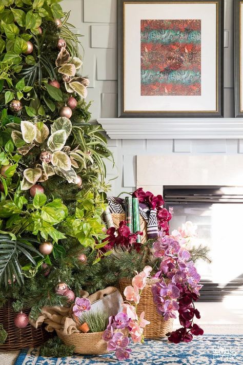 Botanical Christmas Tree with faux plants and ornaments! Great idea for boho style Christmas. Botanical Christmas, Boho Christmas Tree, Christmas Tree Hat, Bohemian Christmas, Music Friends, Pink Ornament, Christmas Tree Inspiration, 50 Christmas, Christmas Tree Ideas