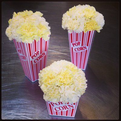 Popcorn flowers Popcorn Flowers, Whimsical Floral Arrangements, Dumbo Birthday, Popcorn Decorations, Popcorn Theme, Deco Cinema, Vintage Circus Theme, Circus Birthday Party Theme, Carnival Parties