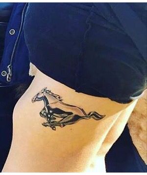 Mustang tattoo Mustang Tattoo For Women, Mustang Tattoo Ideas, Ford Mustang Tattoo, Car Related Tattoos For Men, Tnt Tattoo, Chest Tattoo Lettering, Mustang Tattoo, Mustang 2024, Bestie Tats