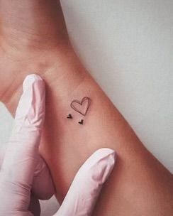 Illenium Tattoo, Simple Heart Tattoo, Wrist Hand Tattoo, Hand Heart Tattoo, Two Hearts Tattoo, Hart Tattoo, Heart Outline Tattoo, Heart Tattoo Ideas, Little Heart Tattoos