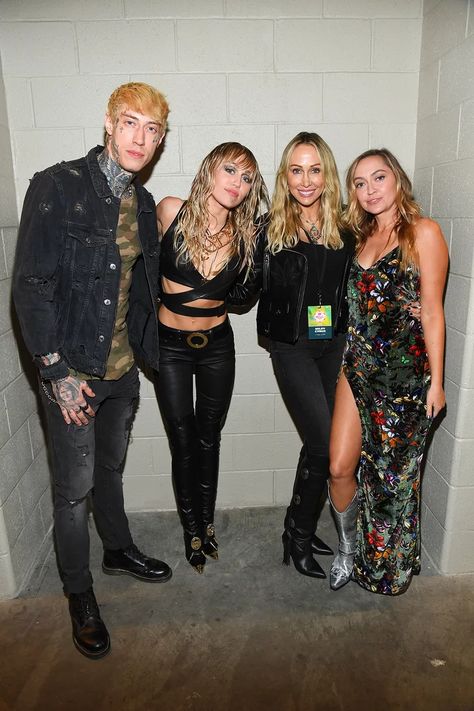 (L-R) Trace Cyrus, Miley Cyrus, Tish Cyrus, and Brandi Cyrus Trace Cyrus, Tish Cyrus, Kaitlynn Carter, Velvet Slip Dress, Figure Poses, Serious Relationship, Miley Cyrus, Pop Star, Music Festival