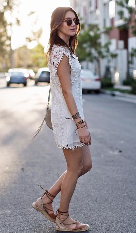 A white lace dress paired with lace-up sandals. Cute Outfits For Italy, Outfits For Italy, Casual Lace Dress, Espadrilles Outfit, Lace Dress Outfit, Simple Work Outfits, Summer Dress Casual, Getaway Outfit, Lace Up Espadrilles