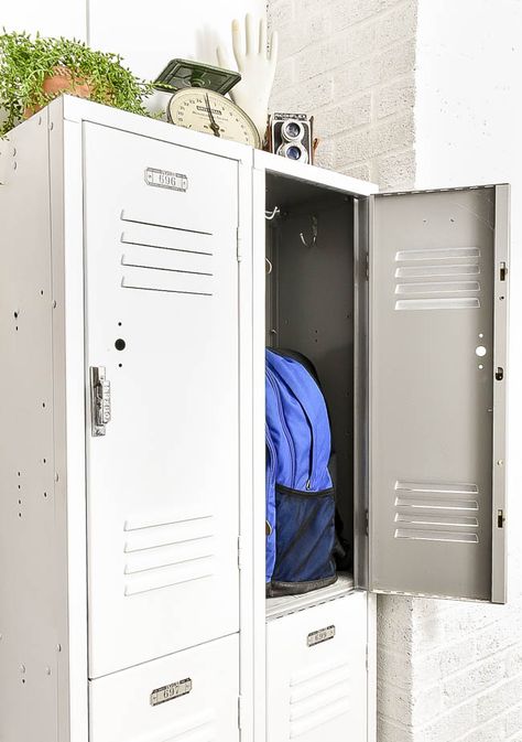 Rusty lockers get a bright white makeover for the perfect industrial mudroom addition! #mudroom #mudroomdecor #lockers #vintagemodern #industrial #industrialdecor #paintedlockers #storage Industrial Mudroom, Painted Mudroom, Locker Makeover, Painted Lockers, Mudroom Addition, Industrial Lockers, Locker Tags, Mudroom Lockers, Mudroom Decor