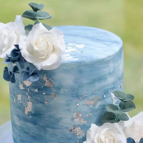 Charlotte | Wedding Cakes | Sugar Flowers on Instagram: "A 2-tier dusky blue wedding cake with watercolour marbled detail and ombre ruffles. Along with sugar flowers surrounded by silver leaf, which reflected the light beautifully. Congratulations to the happy couple who were married today at Low Wood Bay Resort & Spa! #weddingcake #blueweddingcake #lakedistrictwedding #cumbriawedding #sugarflowers #cakedesign #bluewedding #duskyblue #lakedistrict" Blue Ombre Wedding Cake, Dusky Blue Wedding, Blue Ombre Wedding, Cornflower Blue Wedding, Ombre Wedding Cake, Blue Wedding Cake, Wedding Cake Ombre, Lake District Wedding, Ombre Wedding