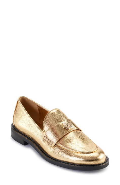 Elevate your everyday look with this prepster-classic loafer given eye-catching appeal by a shimmering golden finish. 1" heel Synthetic upper, lining and sole Imported Metallic Loafers, Loafer Women, Paris Woman, Sneaker Dress Shoes, Karl Lagerfeld Paris, Tommy Hilfiger Women, Sneaker Heels, Loafers For Women, Womens Flats