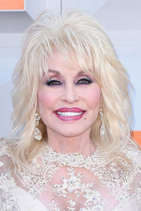 Dolly Parton Has Been a Blond Bombshell For 73 Years, and We Have Proof Dolly Parton Tattoos, Blond Bombshell, Dolly Parton Pictures, Bouncy Hair, Popsugar Beauty, 50th Wedding Anniversary, Celebrity Beauty, 50th Wedding, Pink Eyes