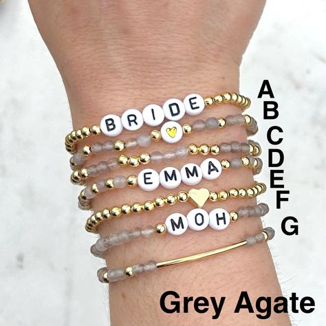 🔹 Design the custom name bracelet stack that you have always wanted! These minimalist stacking bracelets can be personalized so you can get exactly what you want.🔹They are made with 4mm gemstone beads, 4mm 18k gold plated beads, 18k gold filled beads, sterling silver beads or rose gold beads and then strung together with a strong elastic cord.🔹EACH BRACLET IS ORDERED SEPARATELY. Please add each bracelet style separately to your cart. They will be sent to you as a stack. If you want all seven Name Bracelets, Rose Gold Beads, Grey Agate, Stacking Bracelets, Bracelet Style, Organza Ribbon, Name Bracelet, Bracelet Stack, Gold Beads