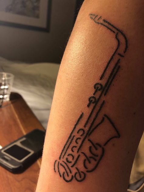 Line Art Saxophone. Done at Electric Ladyland New Orleans Tiny Saxophone Tattoo, Saxophone Tattoo Ideas, Alto Saxophone Tattoo, New Orleans Inspired Tattoo, Jazz Tattoo Ideas, Sax Tattoo, Jazz Tattoo, Saxophone Tattoo, New Orleans Tattoo