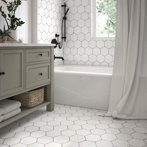 A hexagon with a farmhouse vibe, this on trend distressed porcelain tile will give your space that vintage look that fits every style or design. Elida Ceramica Edgefield White 6-in x 6-in Matte Porcelain Floor and Wall Tile (0.209-sq. ft/ Piece) | LW20121810 White Hexagon Tiles Bathroom, Bathroom Remodel With Hexagon Tile, Hexagon Tiled Shower Ideas, Tile Inspo Bathroom, Small Bathroom Ideas Hexagon Tiles, Hexagon Porcelain Tile Bathroom Floor, White Tiled Bathroom Floor, White And Black Hexagon Tile Bathroom, White Octagon Tile Bathroom Floor