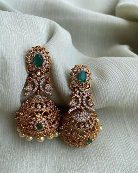 Stone Studded American Diamond Peacock Jhumkas By Daivik Stone Jumkas Design, Daivik Jewellery, Peacock Jhumkas Gold Earrings, Stone Studs Gold, Gold Ear Rings, Stone Earrings Gold, Diamond Jhumkas, Temple Jewellery Earrings, Indian Jewelry Earrings