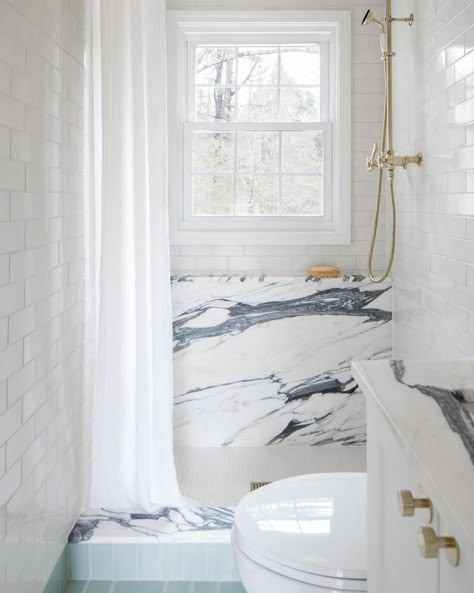 Marble bathroom with shower Subway Tile Shower Designs, Ogee Drop Tile, Gold Shower Head, White Subway Tile Shower, Colonial Cottage, Subway Tile Showers, Sarah Sherman, Iron Stone, Sarah Sherman Samuel