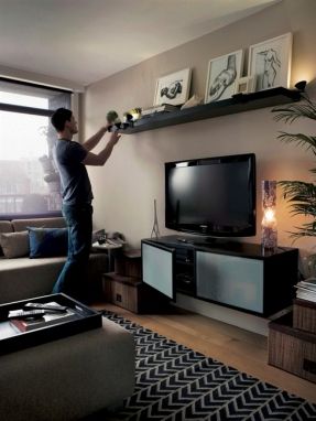 Hmmm... I'd never thought about floating out wall cabinet... I think seeing all the way tothe wall would make the room feel larger... Shelf Above Tv, Ikea Lack Shelves, Long Living Room, Deco Studio, Flat Screen Tv, Tv Wall Decor, Trendy Living Rooms, Room Shelves, Living Room Shelves