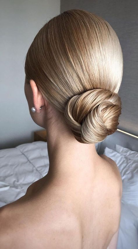 2. Sleek Low Bun We don’t know about you, but we’re kind of over updo hairstyles, especially hot warmer seasons are ahead of us. ... Sleek Bun Hairstyles, Sleek Low Bun, Low Bun Wedding Hair, Medium Hair Up Dos, Medium Hair Up, Sanggul Modern, Hair In A Bun, Wedding Bun Hairstyles, Up Dos For Prom