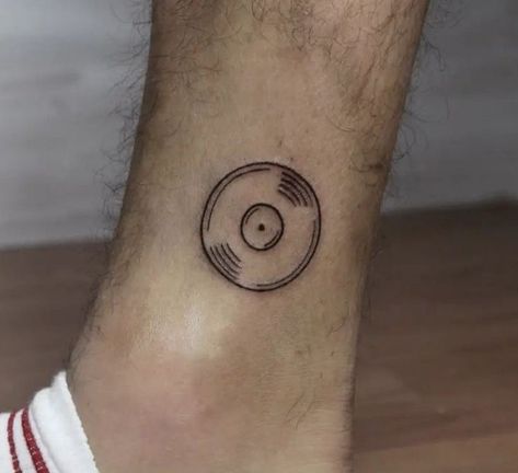 Simple Record Tattoo, Album Inspired Tattoos, Small Record Tattoo, Vinyl Record Tattoo Minimalist, Small Vinyl Record Tattoo, 70s Music Tattoo, 80s Inspired Tattoos, Vynil Record Tattoo, Vinyl Tattoo Minimalist