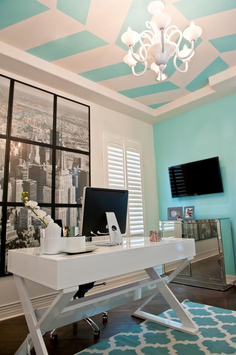 This dreamy home office is perfectly accented by Tiffany blue and white on the ceiling, walls and patterned area rug. A sleek white desk provides a great work area, while the black and white wall art of the city complements the contemporary space. Home Office Blue, Blue Home Offices, Office Blue, Blue Office, Contemporary Home Office, Blue Living Room, Trendy Home, Cheap Decor, Home Office Design