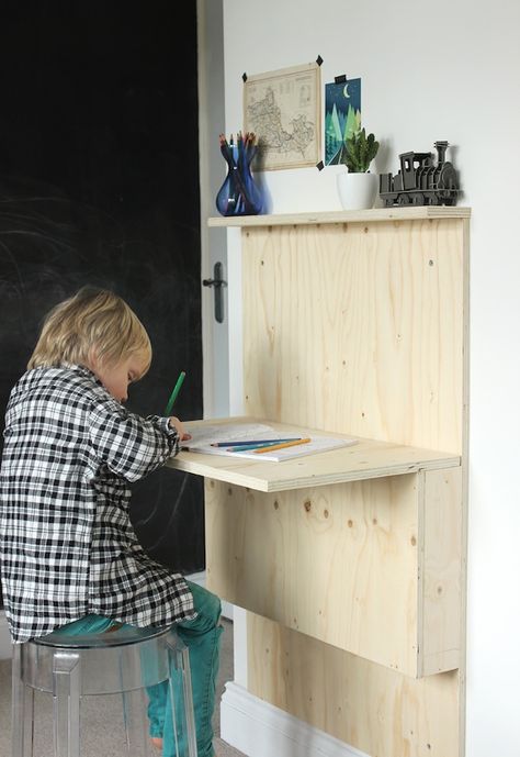 Kids' fold-down plywood desk | Growing Spaces                                                                                                                                                                                 More Outdoor Themed Bedroom, Diy Kids Desk, Small Kids Bedroom, Plywood Desk, Indoor Climbing Wall, Fold Down Desk, Folding Desk, Kids' Desk, Diy Bedroom