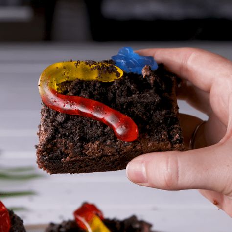 To celebrate the return of The Lion King we made these adorable grub brownies! Cute gummy worms and bugs are crawling out of the "dirt Oreos" for the cutest possible way to eat grub. Hakuna Matata! Get the recipe at Delish.com. #delish #easy #recipe #lionking #grub #grubbrownies #dirt #dirtoreos #gummy #lionkingdessert #disney #baking #baking #ideas Torte Cupcake, Gummy Worms, Chicken Pot, The Lion King, Brownie Recipes, Yummy Food Dessert, The Lion, Food Cravings, Diy Food