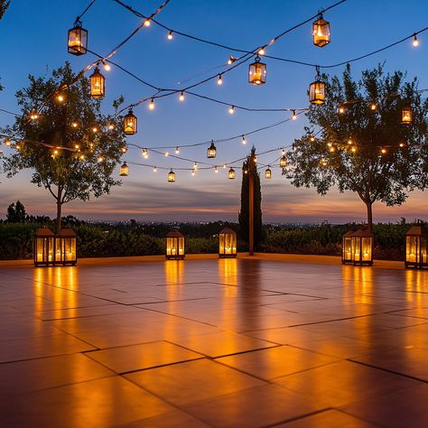 Some lights, preferably string lights, are supposed to be given on a dance floor when it is being set up for an outdoor wedding. If a couple wants to create a more tranquil mood, they may opt for lanterns that produce a sort of fairy-tale sense of magic in the outdoors. In the case of a wedding reception, it would work in the opposite way. The latest trend of the illuminated dance floor was carried out by inserting tiny LED-lit tiles around the platform or installing one that would pop on as patrons went around it. Diy Outdoor Dance Floor Wedding, Dancing Floor Wedding Outdoor, Italian Wedding Dance Floor, Dance Floor Wedding Decor, Floor Decorations Wedding, Outdoor Wedding Dance Floor Ideas, Wedding Dance Floor Decorations, Backyard Dance Floor, Dance Floor Decorations