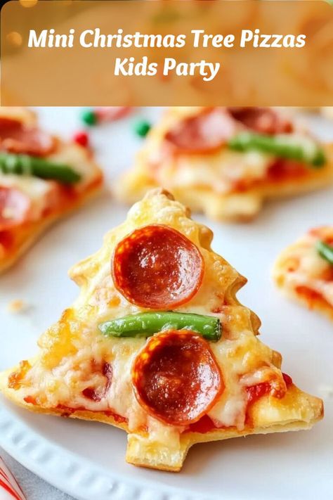 Bite-sized savory pizzas shaped like Christmas trees, a hit for youth Christmas party food or easy kid-friendly brunch ideas. Christmas Party Snacks For Kids, Youth Christmas Party, Party Snacks For Kids, Healthy Christmas Party Food, Preschool Treats, Christmas Party Food Ideas, Christmas Party Snacks, Pizza Shapes, Snacks For Kids