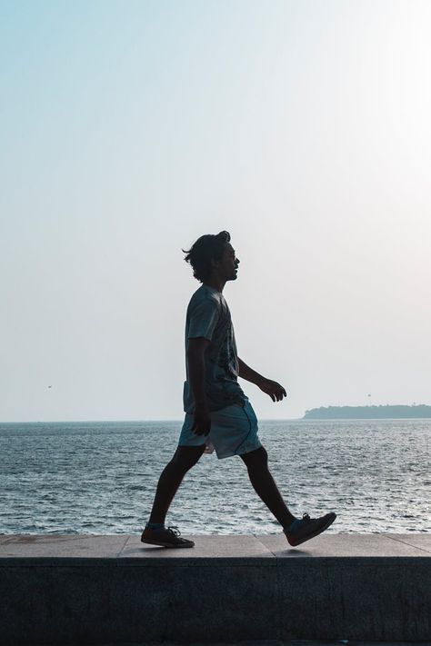 Man Walking Near Body of Water Person Walking Reference Photo, Person Walking Photography, Walking Sideways Reference, Two People Walking Together Reference, Person Walking Drawing Reference, People Walking Photography, Person Walking Side View, Man Walking Reference, People Walking Reference