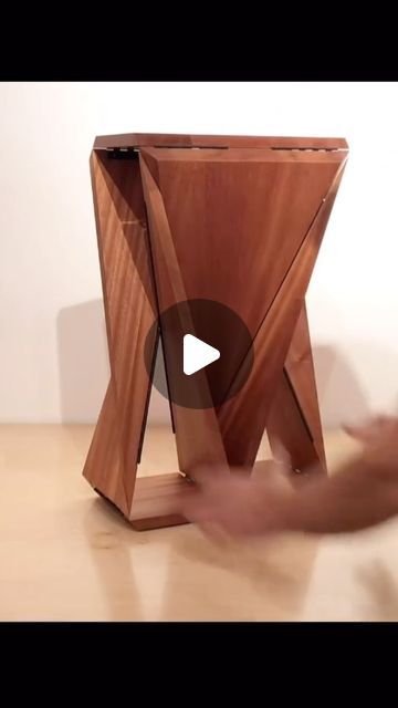 Yanko Design on Instagram: "The Loop Table is a flat pack, origami-inspired folding side table that showcases the intricate folding mechanism we see from Brian Ignaut’s works.
-
Initially launched in 2018, the Loop Table is made from CNC machined hardwood and stainless steel hardwood. For now, the designer is considering bringing back these stools - would you like one?
- 
Designer: @degreesoffreedomco 
-
Follow us at the new Yanko Design page @yankodesign_official as our previous account is currently unavailable." Folding Side Table, Folding Mechanism, Design Page, Yanko Design, Flat Pack, The Loop, Cnc Machine, Plant Stand, Stools