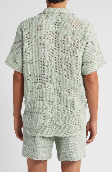 An abstract take on botanical motifs is brought to life in the cotton-blend crochet of this camp shirt in an eased-up, relaxed fit. 30" length; 43" chest (size Medium) Front button closure Notched collar Short sleeves 90% cotton, 10% polyester Machine wash, line dry Made in Portugal Mens Summer Knitwear, Men's Summer Outfit, Botanical Motifs, Spring Wardrobe Essentials, Smart Casual Menswear, Knit Structure, Resort Shirt, T Shirt Painting, Boys Knits