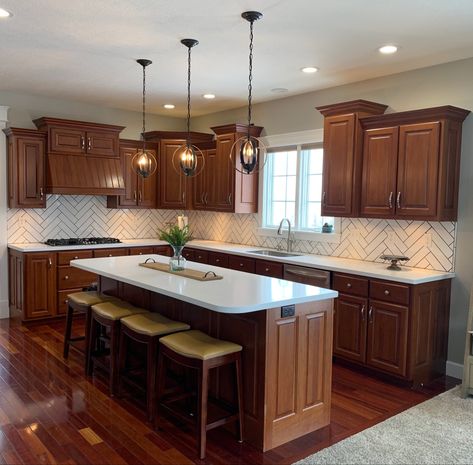 Bar Stools Kitchen Island Cherry Cabinets, Cherry Cabinet Backsplash Ideas, Cherry Kitchen Backsplash, White Subway Tile Kitchen Backsplash With Cherry Cabinets, Cherry Hardwood Floors Kitchen, Kitchen Interior Brown Cabinets, Cherrywood Cabinet Kitchen Decor, Kitchen Inspirations Cherry Cabinets, Cherry Cabinets With Backsplash