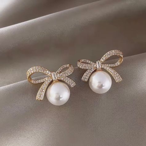 Gold Bow Classic Faux Pearl Formal Stud Earrings Wedding Bridal Jewelry Brand New Never Been Worn New With Tag Nwt Excellent Condition 0.78in Length 0.98in Width Cubic Zirconia Gems Perfect To Dress Up Any Outfit Beautiful Elegant Jewelry Gold Tone For Pierced Ears Very Shiny And Sparkly Lightweight And Comfortable Smoke-Free, Pet Friendly Home Fast Shipping From A Posh Ambassador Top-Rated Seller Gift Christmas Holiday Birthday Engagement Anniversary Present Party Event Ceremony Celebration Din Wedding Party Jewelry, Wedding Bridal Jewellery, Bow Earrings, Fancy Jewelry, Pearl Earrings Dangle, Girly Jewelry, Pearl Stud Earrings, Earring Type, Girls Earrings