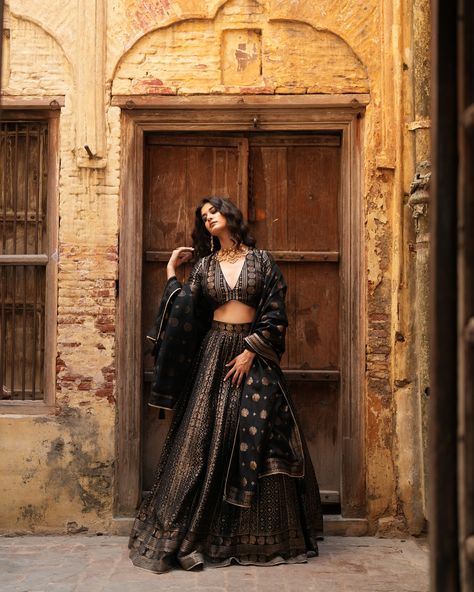 We are forever crushing over our muse @harsohenajaggi in our quintessential black lehenga set! _______ #safaaworld #indianfashion #designersindian #occassionwear #southasianfashion #lehngalove #lehengasaree #lehengacholi #lehengagoals #lehengablouse #lehengacollection #indianethnic #indianethicwear #vegansilk #engagementlook #anarkali #anarkalisuits #anarkalis #anarkalisuit #anarkalidresses #anarkaligown #anarkalisalwar Gold Lehenga Bridal, Black And Gold Lehenga, Beautiful Lehenga, Gold Lehenga, Paisley Motifs, Black Lehenga, Winter Suits, Set Saree, Georgette Tops