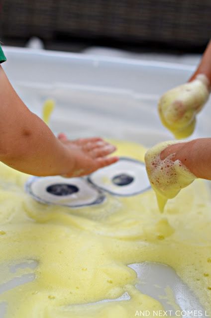 Minion inspired sensory play for kids with lemon soap foam from And Next Comes L Lemon Activities, Disney Activities, Soap Foam, Play For Kids, Lemon Soap, Sensory Bin, Sensory Bins, Sensory Play, Kids Playing