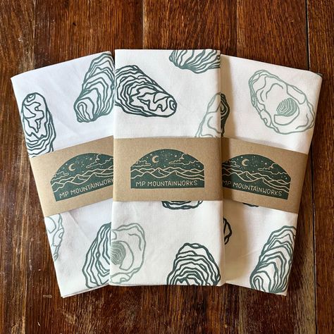 oooookay a little oyster round up: we’ve got tea towels, block prints, and tote bags ready to go for the @milfordoysterfestival on Saturday (and a few shirts that are still drying). Anything that doesn’t sell at the fest will be listed on my shop after 🦪 #oysters #seashells #newengland #blockprinting #printmaking Hand Carved Stamps, Shades Of Teal, Oyster Shells, Cotton Tea Towels, Round Up, Coastal Homes, Ready To Go, Tea Towel, Tea Towels