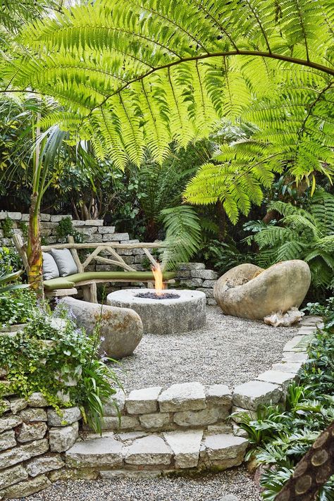 Australian tree ferns drape a hidden firepit nook Outdoor Fireplace Ideas, Australian Tree Fern, Small Patio Design, Australian Trees, Ferns Garden, Outdoor Space Design, Tree Fern, Fountain Design, Sunken Garden